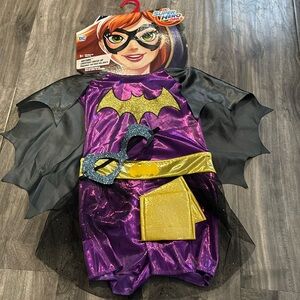 NWT Batgirl costume. In its original packaging. Girls size 4-6X.